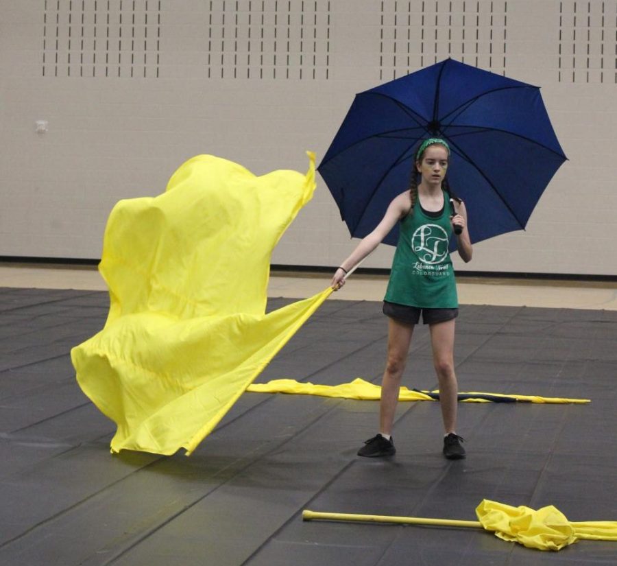 Color Guard practicing Rain on July 31 in the gym. 