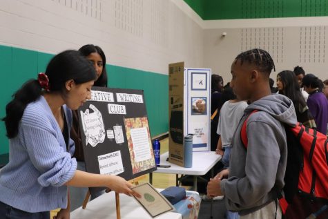 Students inform themselves of extracurricular activities via club fair and other means of communication. Photo Credit: LTHS Yearbook