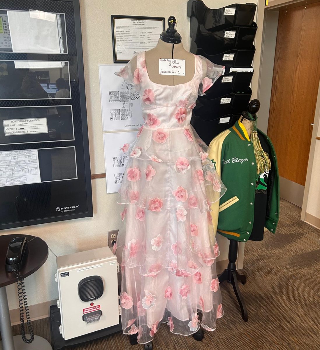 Ella Ramon's dress in the front office.